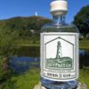 Ulverston Gin Bottle with Hoad behind