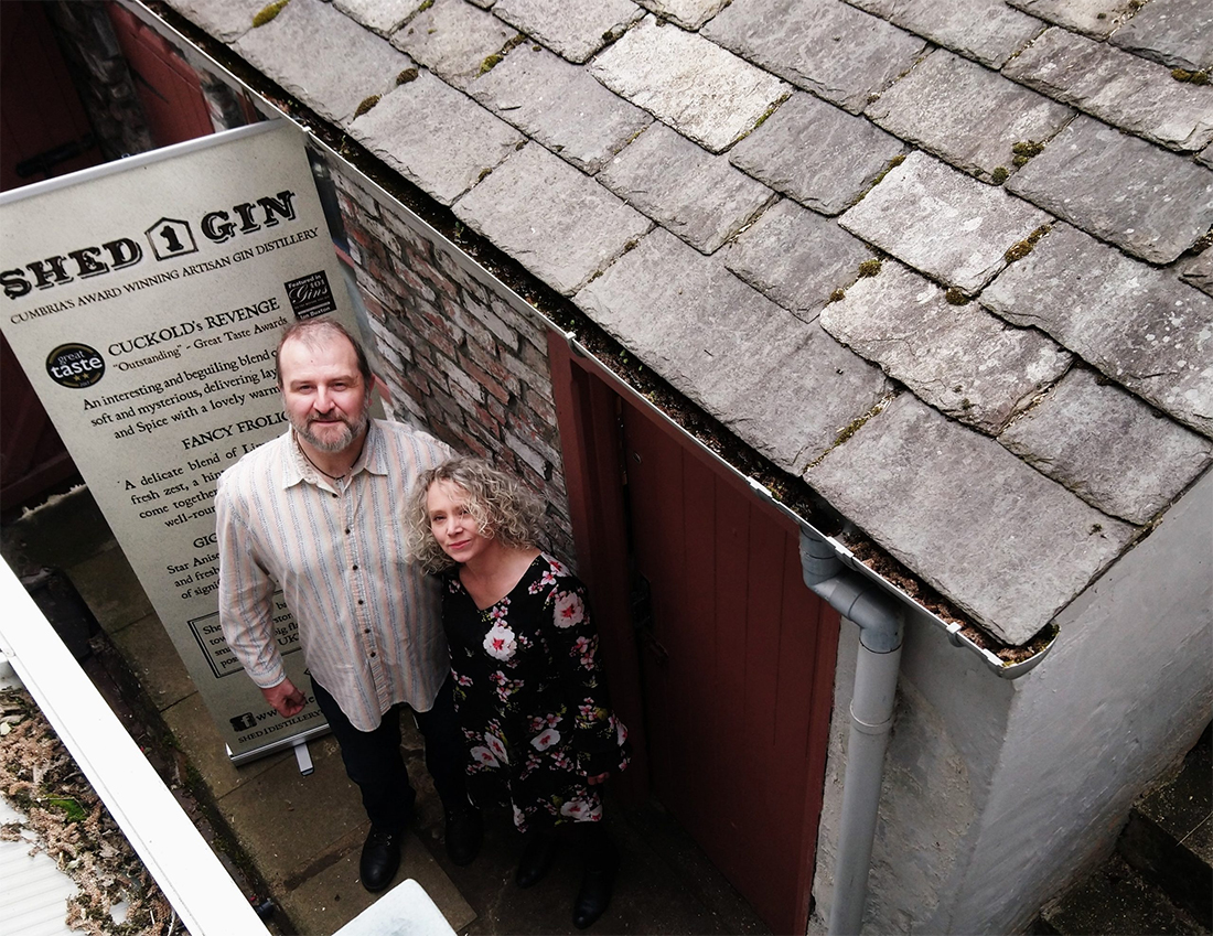 Where it all started. Andy & Zoe outside our 7x7 foot Garden Shed.