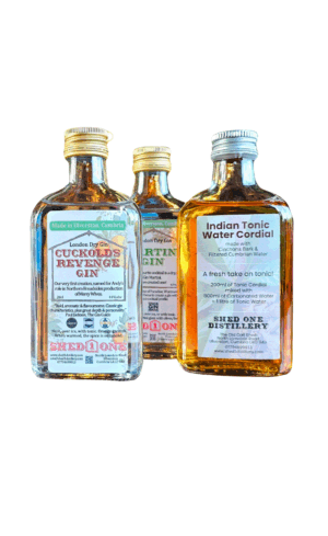 Two bottles of gin and one of tonic cordial