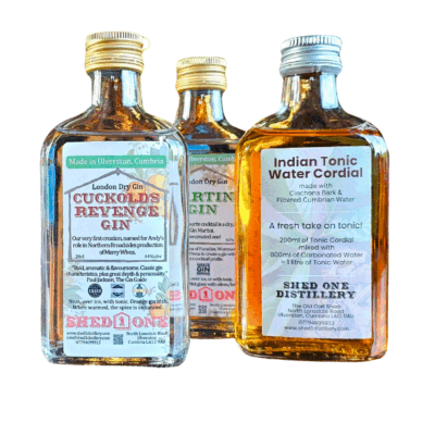 Two bottles of gin and one of tonic cordial